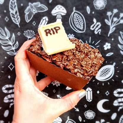 Half Halloween Grave Encounters Brownie with Cornflake top and white chocolate tombstone